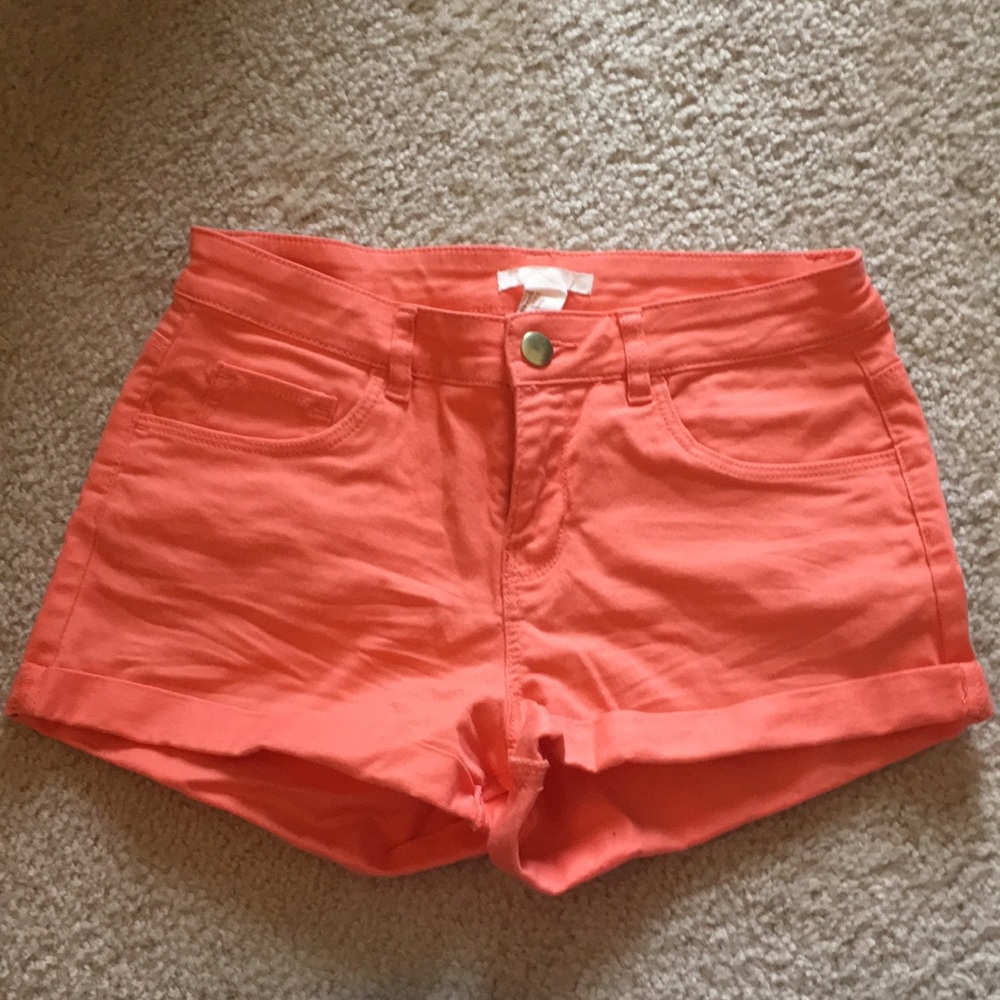 Salmon colored jean shorts